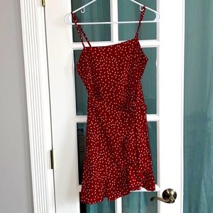 Red with white polka dot wrap dress.